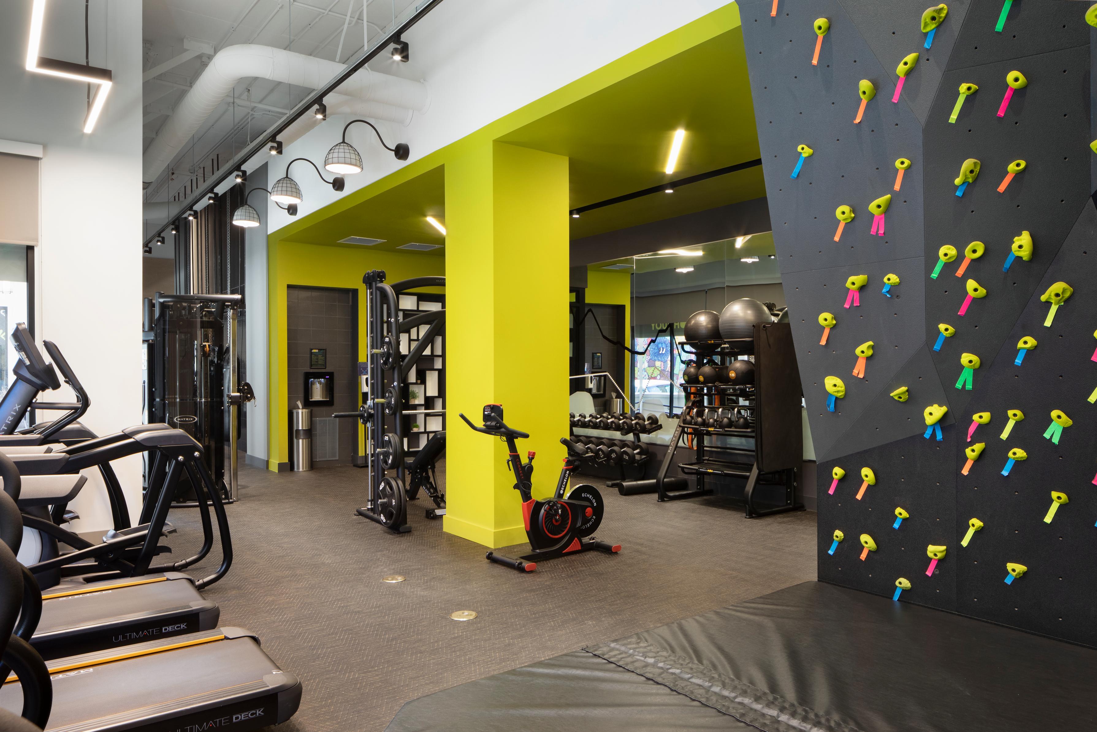 Fitness room with rock climbing wall
